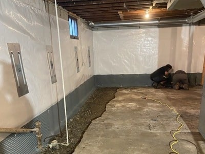 Waterproofing being done by Quality Foundation Repair serving Gretna, IA
