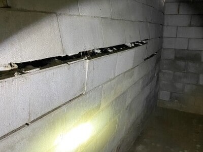Cracked or bowed wall repair done by Quality Foundation Repair working in Papillion, Nebraska